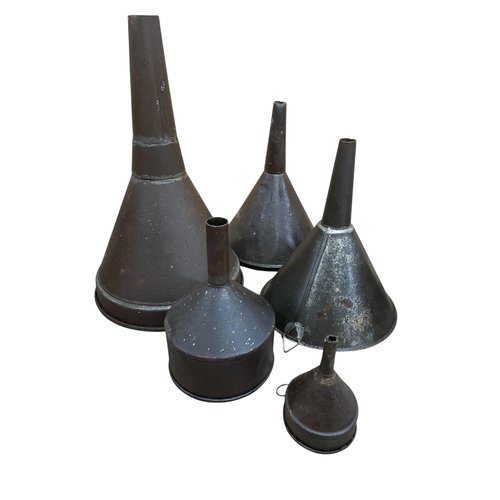 38 - Mixed collection of vintage automobilia to include Esso oil can, oil funnels, Castrol oil can and Ki... 