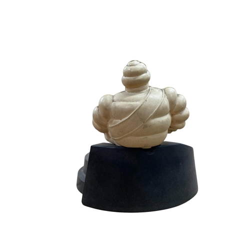 27 - Vintage Michelin bakelite ashtray, 15cm long, with a further Michelin resin ornament (2)