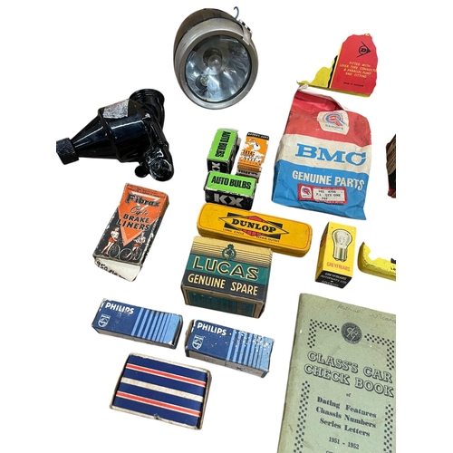 56 - Collection of vintage car and bicycle parts to include new old stock, having Miller and Lucas lights... 