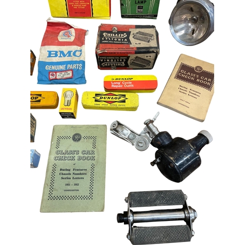 56 - Collection of vintage car and bicycle parts to include new old stock, having Miller and Lucas lights... 