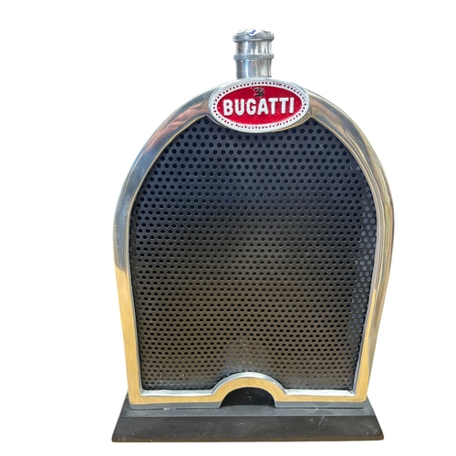 26 - Three display models of Bugatti radiators, including cast aluminium on a plinth base, 50cm high, wit... 