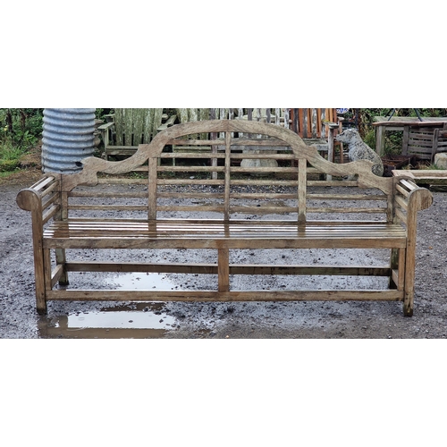 101 - Large four seat teak Lutyens style bench with cushion, H 104cm x W 225cm x D 50cm