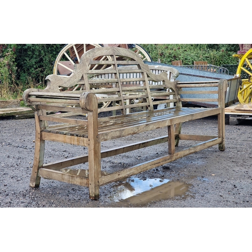 101 - Large four seat teak Lutyens style bench with cushion, H 104cm x W 225cm x D 50cm