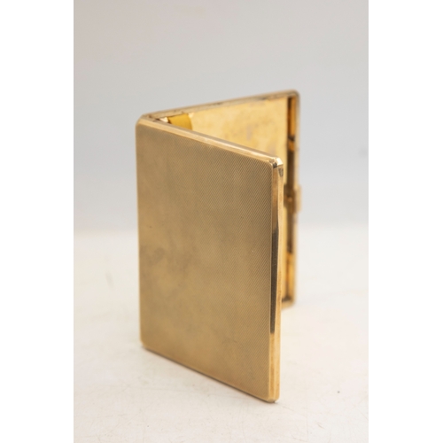 125 - A 9ct gold engine-turned rectangular cigarette case, with an internal inscription dated 1942 and hal... 