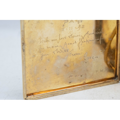 125 - A 9ct gold engine-turned rectangular cigarette case, with an internal inscription dated 1942 and hal... 