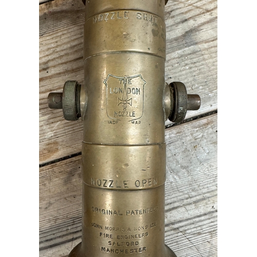 251 - A brass fire hose nozzle, with text 'The London Nozzle, Original Patentees John Morris & Sons Ltd Sa... 