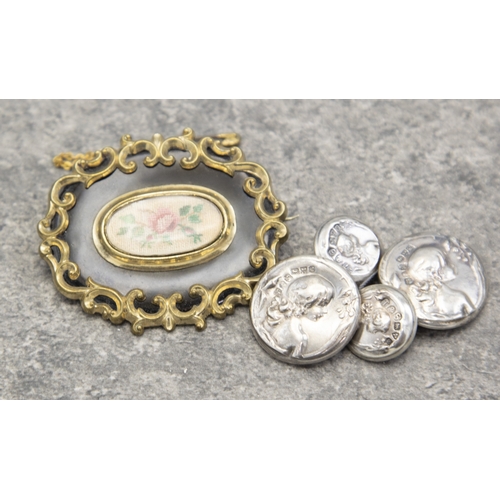 152 - Two pairs of Art Nouveau silver buttons, each embossed with the profile of a young girl within a flo... 