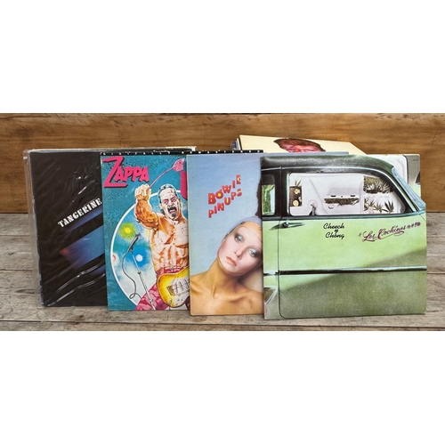 557 - A large collection of mixed genre vinyl