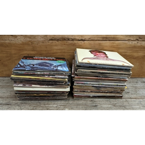 557 - A large collection of mixed genre vinyl