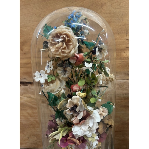 378 - Pair of antique French Globe De Maire floral displays held in glass dome, largest H 53cm