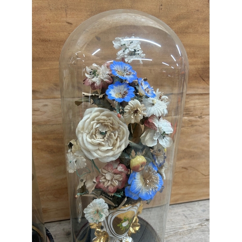 378 - Pair of antique French Globe De Maire floral displays held in glass dome, largest H 53cm