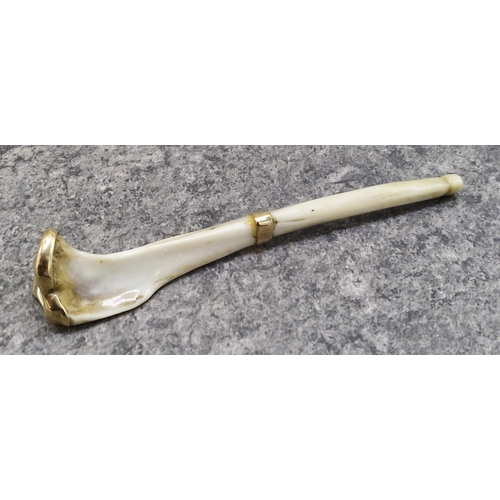 184 - Unusual and macabre gold applied bone cheroot or cigarette holder, 12cm long