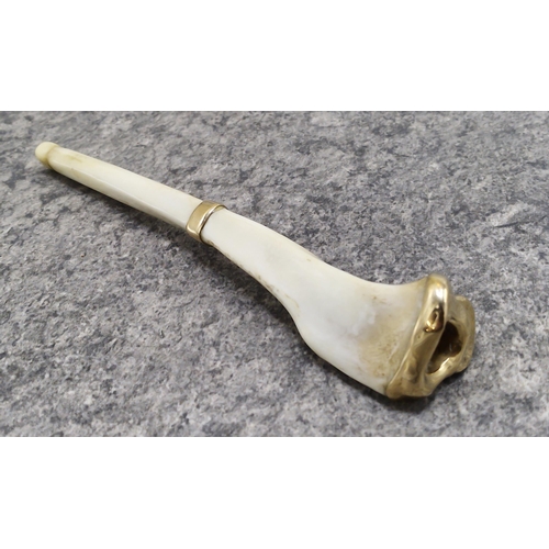 184 - Unusual and macabre gold applied bone cheroot or cigarette holder, 12cm long
