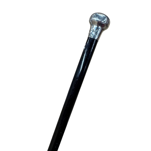 473 - Antique silver capped gentleman's dress cane, having simple flared design with black wooden shaft, L... 
