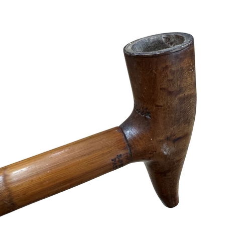 489 - Antique smoker's walking stick, having a pipe bowl handle that unscrews to reveal a stem, and a ferr... 