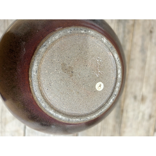 380 - Alan Spencer Green - a brown glazed studio pottery vase and a green crackled vase, largest 30cm, wit... 