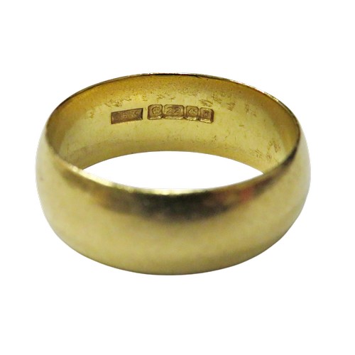2 - A vintage 22ct gold broad wedding band,  hallmarks for Birmingham 1971, 7.7mm wide, size leading-edg... 