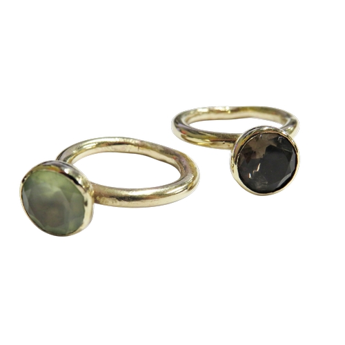 15 - Two handmade smokey-quartz or pale-green prehnite single stone 'stacking' dress rings, each cupola m... 
