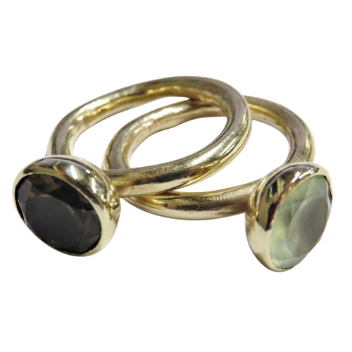 15 - Two handmade smokey-quartz or pale-green prehnite single stone 'stacking' dress rings, each cupola m... 