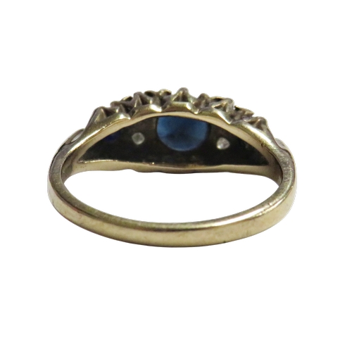 16 - A vintage 9ct gold, sapphire and diamond dress ring, the three graduated oval and round dark-blue/bl... 
