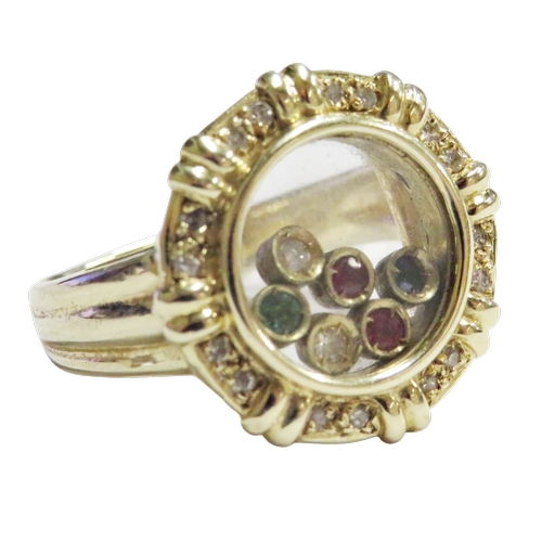 17 - A Continental multi-gem ring resembling a 'happy diamonds' glazed cluster, the shaped-round head enc... 
