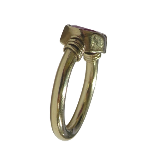 18 - A Continental fracture-filled-ruby single stone ring, the oval mixed-cut opaque stone approx. 10mm x... 