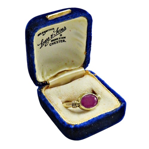 18 - A Continental fracture-filled-ruby single stone ring, the oval mixed-cut opaque stone approx. 10mm x... 