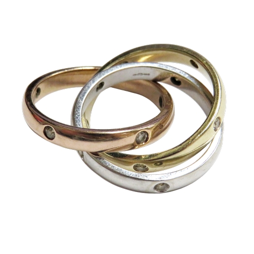 20 - A 9ct tri-colour gold and diamond 'Constellation' trilogy ring, each band inset with five small roun... 