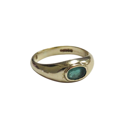 23 - A 9ct gold and oval emerald single stone ring, centred with an oval mixed-cut emerald approx. 0.34ct... 