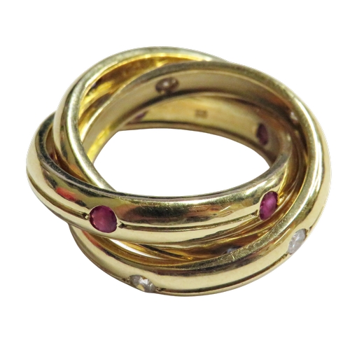 24 - Cartier, a vintage 18ct gold, ruby, sapphire and diamond 'Constellation' trilogy ring, import hallma... 