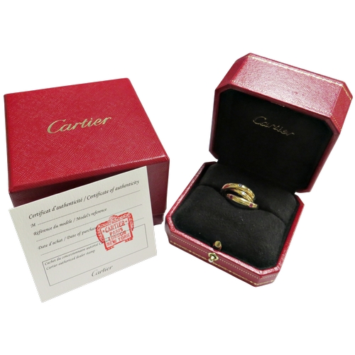 24 - Cartier, a vintage 18ct gold, ruby, sapphire and diamond 'Constellation' trilogy ring, import hallma... 