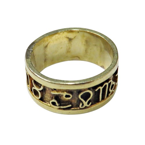 26 - An American South West 'Navajo' yellow-metal broad-band 'zodiac symbols' ring, approx. 9mm wide, siz... 