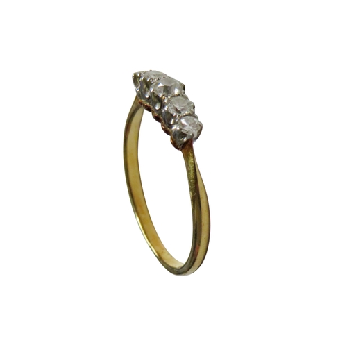 29 - A mid-20th century gold and diamond five stone ring, the graduated old-cut and early round brilliant... 