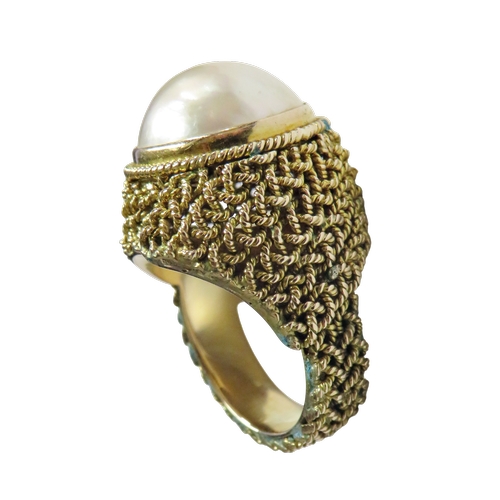31 - A vintage Continental gold and mabe-pearl ring probably American, the mabe pearl approx. 15.5mm diam... 
