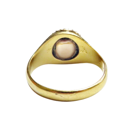 32 - A Victorian topaz and half-pearl oval cluster later mounted in a 22ct gold signet-type ring, the cen... 