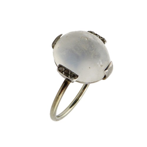 37 - A mid-20th century platinum, moonstone and tiny diamond ring, the oval moonstone measures approx. 13... 