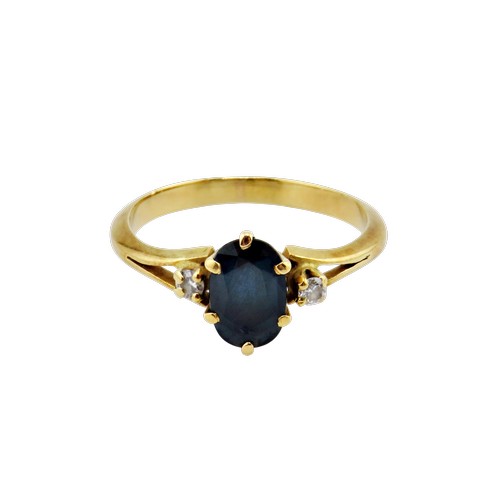 41 - A vintage French gold, sapphire and diamond three stone ring, centred with a very dark blue/black ov... 