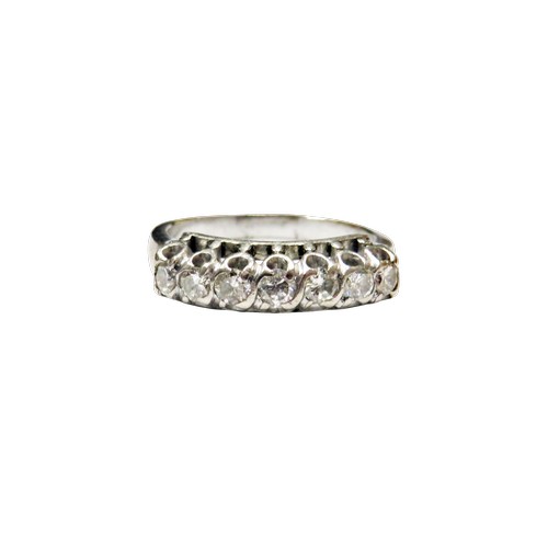 45 - A diamond seven stone ring, the round brilliants approx. 0.70cts total, all claw set in white with s... 
