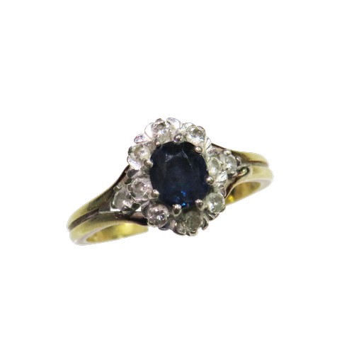 47 - A vintage 18ct gold, sapphire and diamond oval cluster ring, centred with an oval mixed-cut sapphire... 