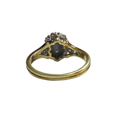 47 - A vintage 18ct gold, sapphire and diamond oval cluster ring, centred with an oval mixed-cut sapphire... 