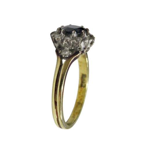 47 - A vintage 18ct gold, sapphire and diamond oval cluster ring, centred with an oval mixed-cut sapphire... 