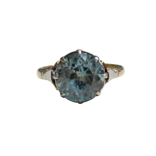 48 - A vintage gold and blue zircon single stone ring, the zircon-cut stone approx. 10mm diameter, claw s... 