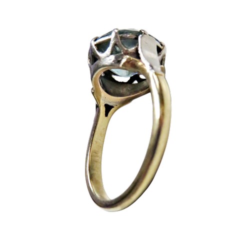 48 - A vintage gold and blue zircon single stone ring, the zircon-cut stone approx. 10mm diameter, claw s... 