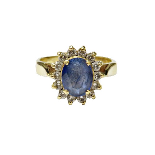 49 - A vintage Continental sapphire and diamond oval cluster ring, centred with a pale-blue oval mixed-cu... 