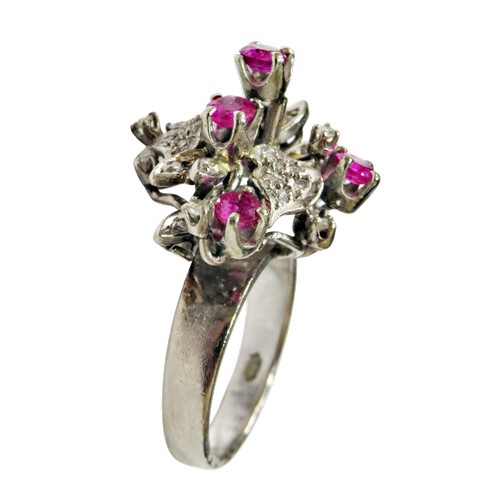 51 - A vintage ruby and diamond abstract floral cluster ring, in the form of leaves and flower-heads in a... 