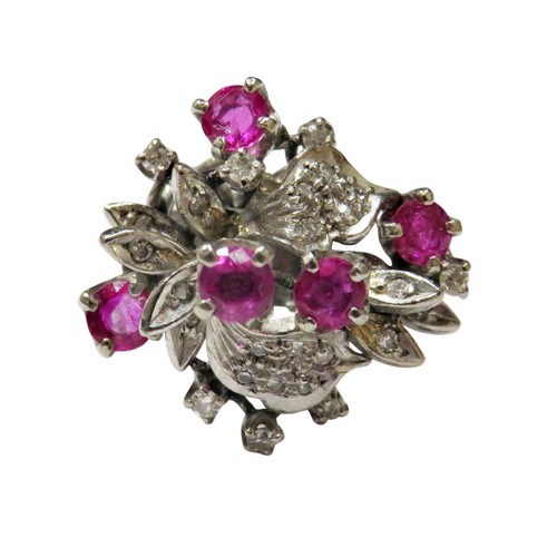 51 - A vintage ruby and diamond abstract floral cluster ring, in the form of leaves and flower-heads in a... 