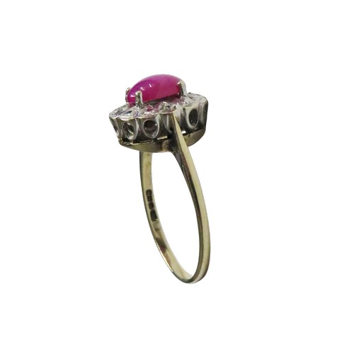 53 - A vintage 9ct gold, synthetic star ruby and diamond oval cluster ring,  the centre stone claw set wi... 