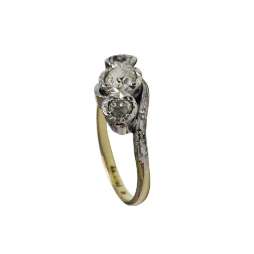 54 - A vintage gold and diamond three stone cross-over ring, the old-cut stones approx. 0.48cts total, il... 