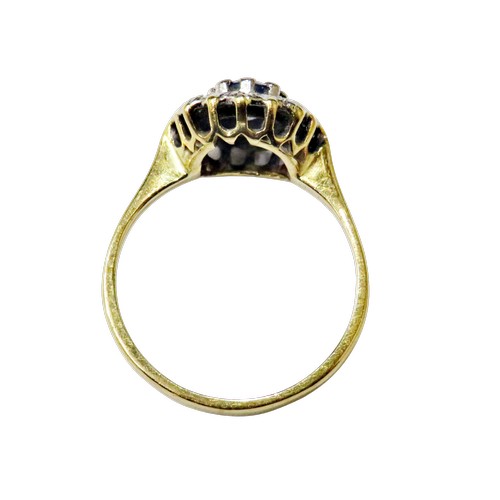 60 - A vintage sapphire and diamond cluster ring circa 1935, centred with a pale-blue round mixed-cut sap... 