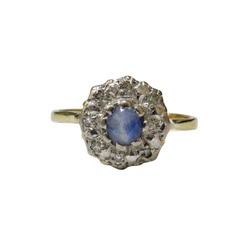 60 - A vintage sapphire and diamond cluster ring circa 1935, centred with a pale-blue round mixed-cut sap... 